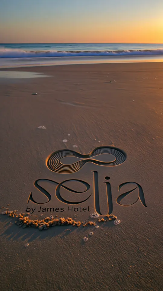 The Selia logo carved into wet sand at sunset